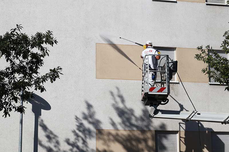 Sichere Garantie auf Fassadenschutz nach einer Fassadenwäsche von der Firma AlgenfiX Fassadenreinigung